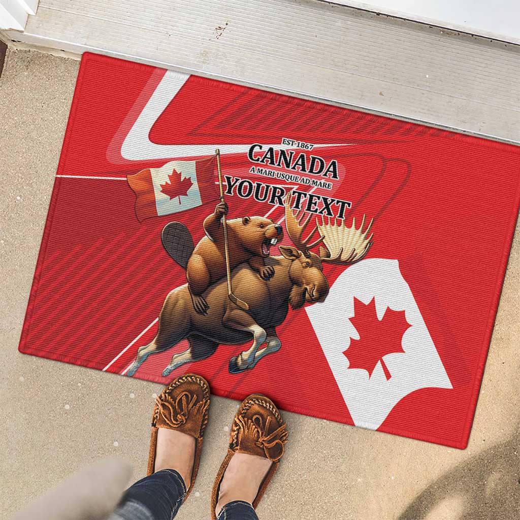 Red rubber doormat with Canada flag, beaver and moose artwork, and “YOUR TEXT”