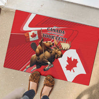 Red rubber doormat with Canada flag, beaver and moose artwork, and “YOUR TEXT”