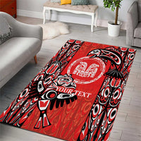 Red tribal style area rug with black-and-white motifs and round emblem, YOUR TEXT