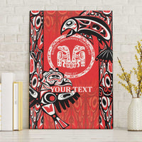 Red canvas wall art with black-and-white Haida-style totem emblem and “YOUR TEXT”