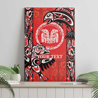 Red canvas wall art on display shelf with Haida-style emblem and “YOUR TEXT”