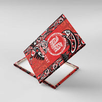 Red canvas wall art at angle with black-and-white Haida emblem and “YOUR TEXT”