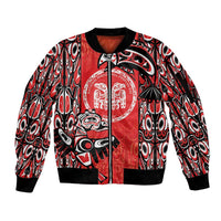 Red zip-up bomber jacket with black and white tribal animal artwork, ribbed cuffs