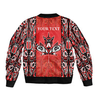 Red bomber jacket back with 'YOUR TEXT' star-and-mask tribal graphic, ribbed hem