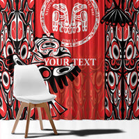 Close-up tribal design curtain panel in red, black, and white with large totem artwork