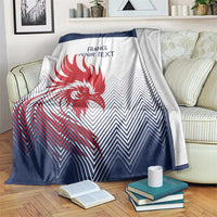 France rugby blanket over sofa, white and dark blue with red rooster graphic and custom text