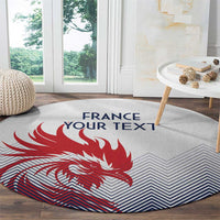 Round rug with red rooster design, blue zigzag chevrons, and “FRANCE”/“YOUR TEXT”.