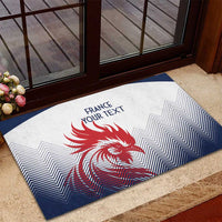 Rubber doormat in white and navy with red rooster design, zigzag pattern, and 'FRANCE YOUR TEXT'.