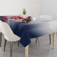 Navy and white chevron tablecloth on dining table with place settings