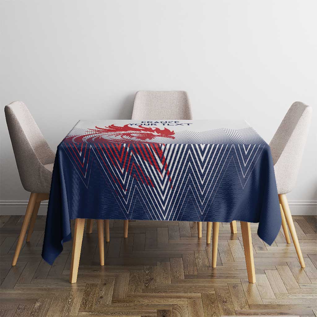 Blue and white chevron tablecloth covering round table with gray chairs