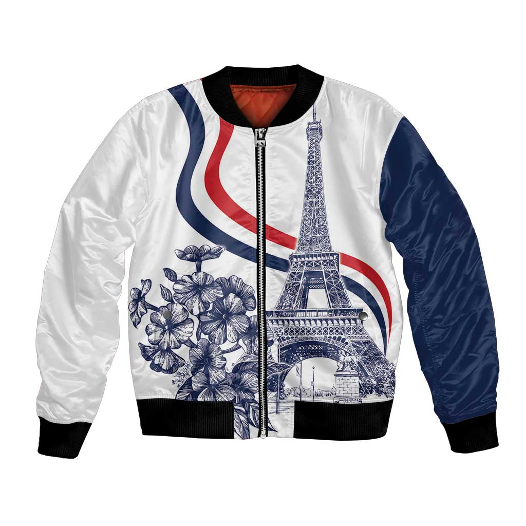 White bomber jacket with navy sleeves, black ribbed cuffs, front zipper, Eiffel Tower and flowers