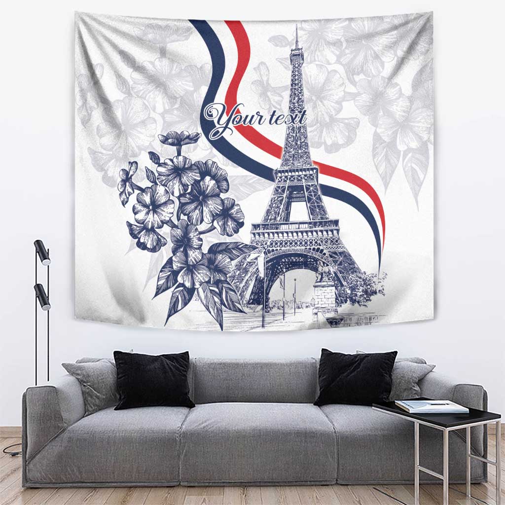 White tapestry wall hanging with Eiffel Tower, blue floral print and red-white-navy stripes.