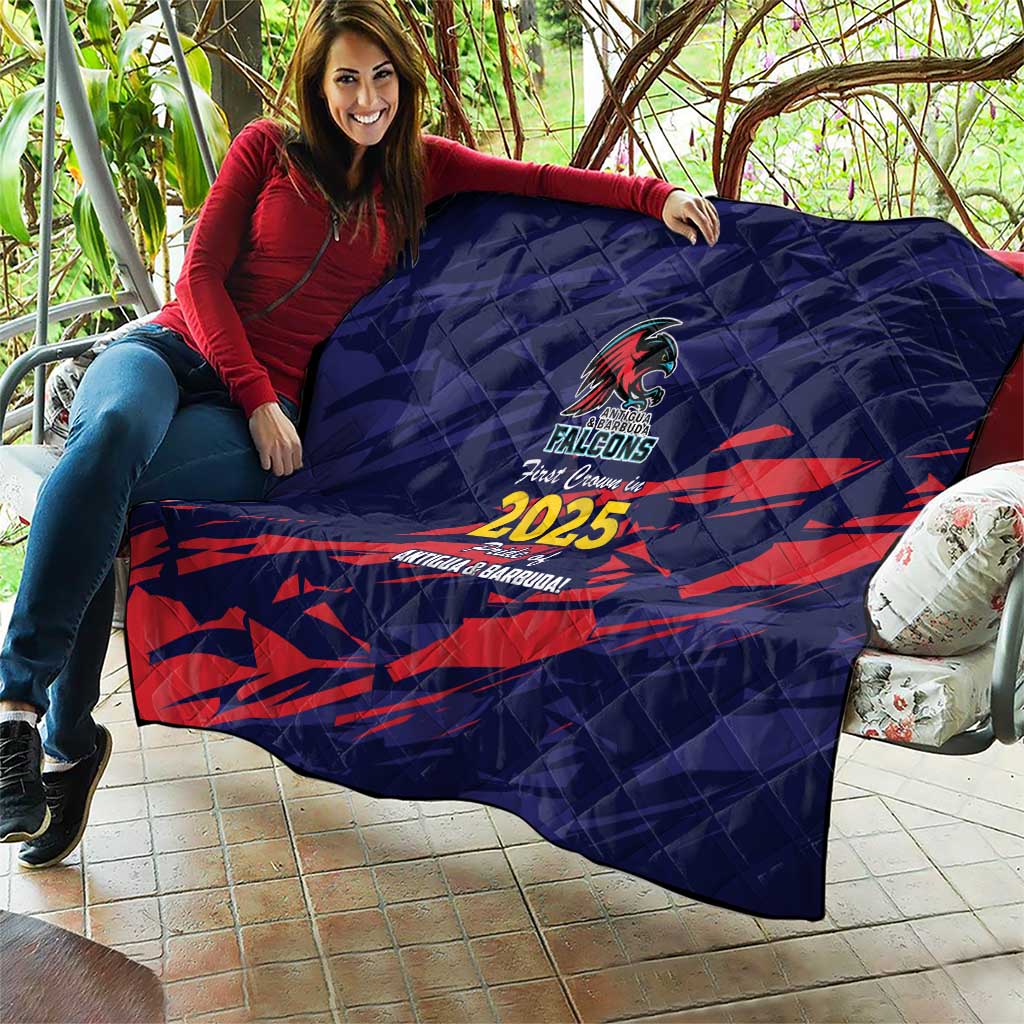 Navy quilt held outdoors with red diagonal graphics, Falcons crest and 2025 design