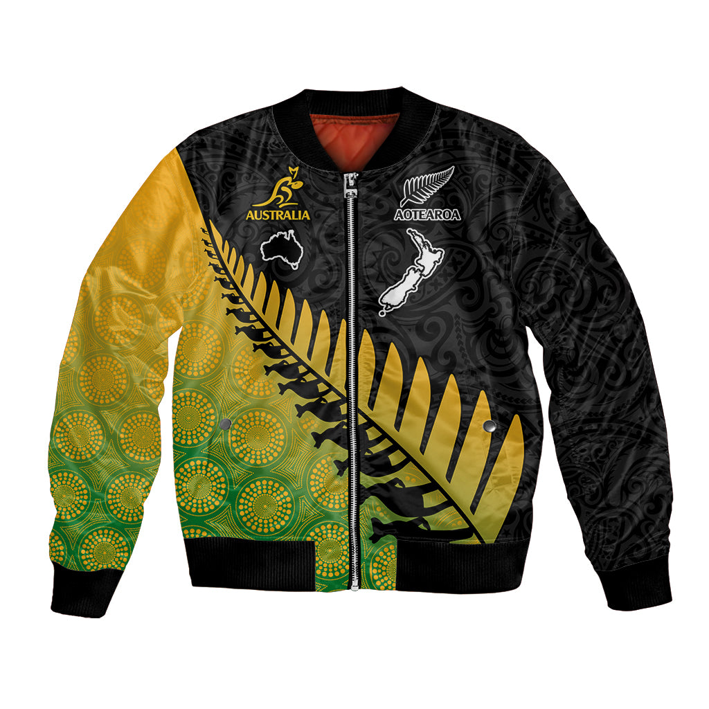Unisex bomber jacket with black front zip, gold/green gradient and Maori-style fern graphic