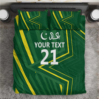 Green bedding set with yellow geometric pattern, white “YOUR TEXT 21” and crescent star