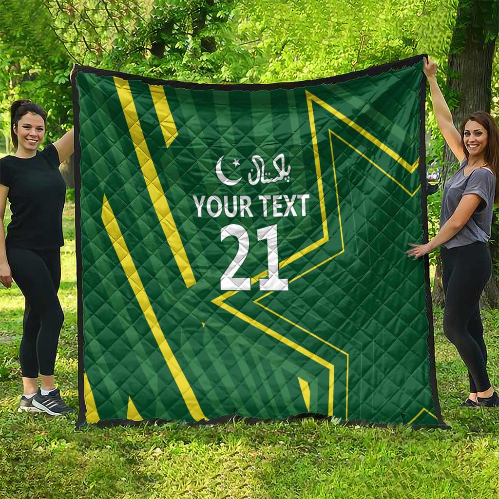 Green custom quilt with yellow geometric pattern and centered 'YOUR TEXT 21'