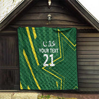 Green custom quilt with yellow geometric pattern and 'YOUR TEXT 21' design