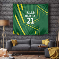 Green custom tapestry wall hanging with yellow geometric stripes and Arabic text, number 21