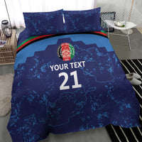 Blue bedding set with map artwork, crest logo, “Your Text 21,” and striped band