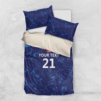 Blue duvet set with map print and “Your Text 21” text on matching pillowcases