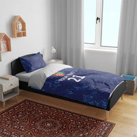 Blue custom duvet with map design, “Your Text 21,” and matching blue pillowcases