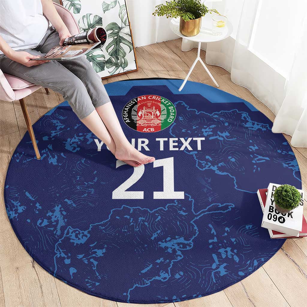 Round blue carpet with “Your Text 21” over Afghanistan map and cricket crest