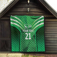 Green quilt blanket hanging on wall, jersey stripes, 'YOUR TEXT' and number 21