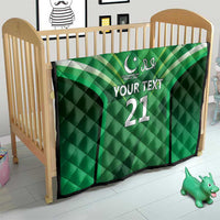 Green quilt blanket on baby bed, jersey stripes, 'YOUR TEXT' and number 21