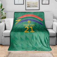 Green cricket blanket with flag stripes, Proteas crest, and 'YOUR TEXT 21' design.
