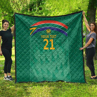 Green quilt blanket with quilted texture, rainbow Proteas emblem and “YOUR TEXT 21”