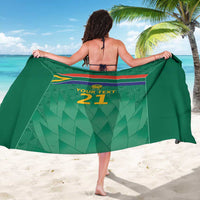Green custom cricket sarong draped back, 'YOUR TEXT 21' and flag stripe band