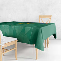 Green cricket tablecloth corner drape with purple trim along the edge