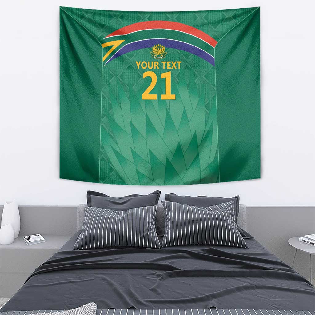 Green wall tapestry featuring Proteas crest, rainbow arc, and “YOUR TEXT 21”