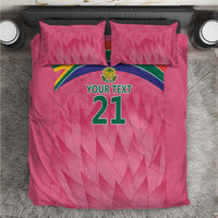 Pink bedding set with 'YOUR TEXT 21' graphic and Proteas crest, two matching pillows