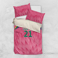 Pink bedding set with 'YOUR TEXT 21' graphic, duvet and two matching pillowcases