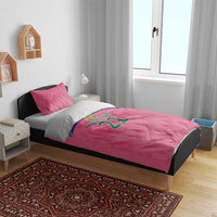 Pink bedding set with 'YOUR TEXT 21' graphic on duvet and two pink pillows