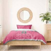 Pink bedding set with 'YOUR TEXT 21' graphic on duvet and two matching pillowcases