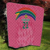 Pink quilt with Proteas crest, rainbow arc and '21' on diamond-quilted surface