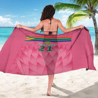Pink custom cricket sarong draped over shoulders, Proteas-style crest and number 21