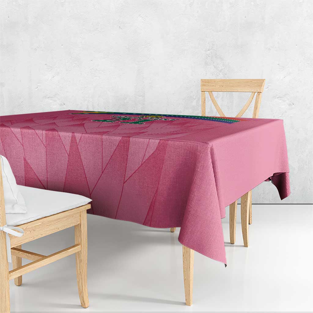Pink cricket tablecloth with geometric pattern on rectangular table