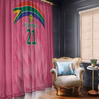 Pink window curtain panel with cricket emblem and custom text, hanging at a window