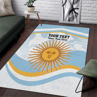 Blue area rug with large sun graphic, custom text banner, and curved wave pattern