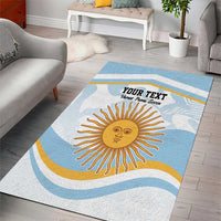 Blue area rug with central sun face design and wavy stripes, custom text banner
