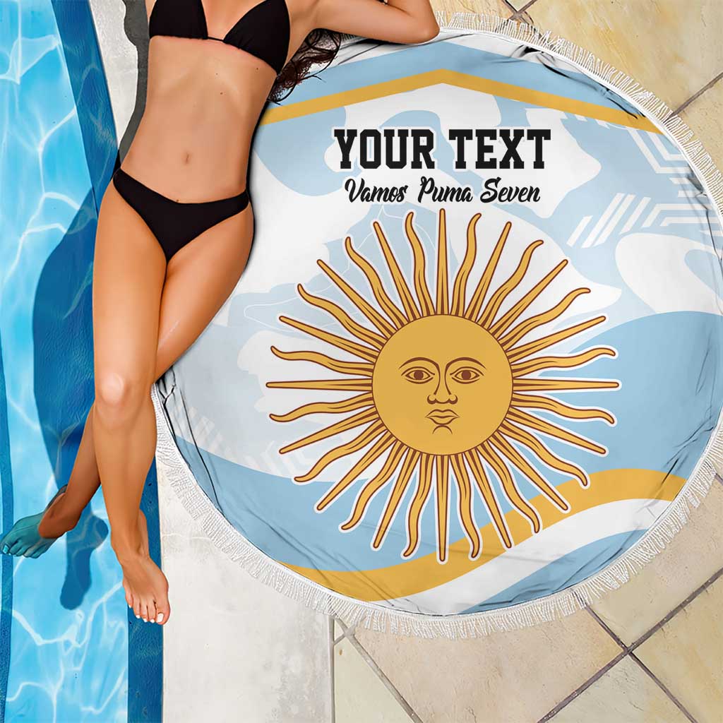 Round light blue beach blanket with fringe, sun face graphic and text, by pool with bikini.