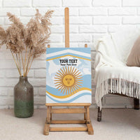 Blue canvas wall art on wooden easel with custom text and sun face design