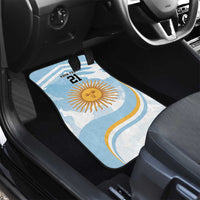 Blue car floor mat with Argentina sun and "21" near the center console