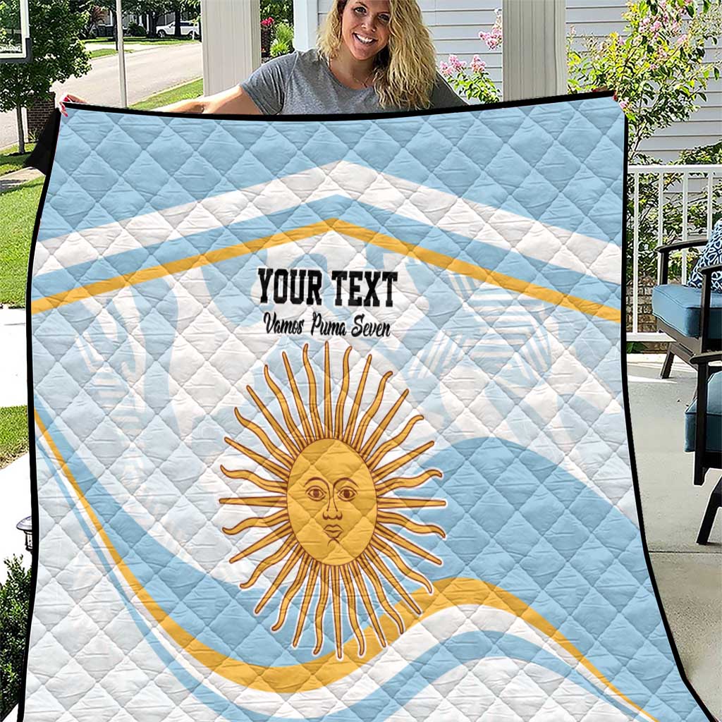 Blue and white quilt with diamond stitching, Argentina sun face graphic and custom text
