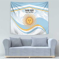 Blue Argentina flag-style tapestry featuring a sun face emblem, wave stripes, and custom text.