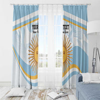 Blue-and-white printed curtains with large sun face and diagonal stripe pattern