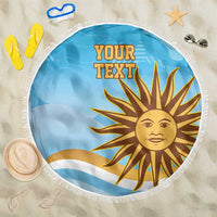 Blue round beach blanket with white fringe, sun face and "YOUR TEXT" design